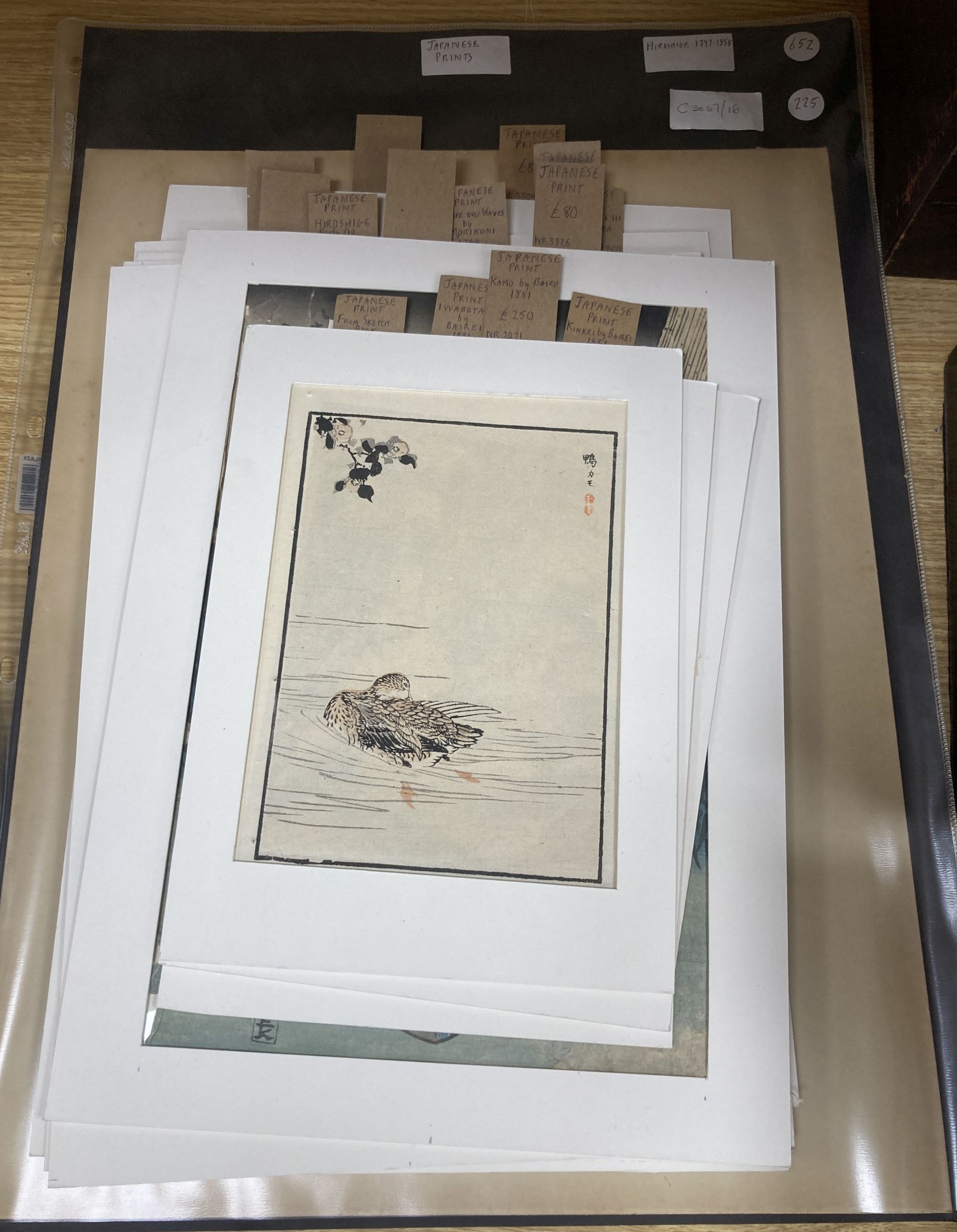 A group of assorted unframed Japanese woodblock prints, largest 36 x 23cm